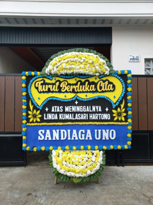 Papan Bunga Duka di Tomagoba
